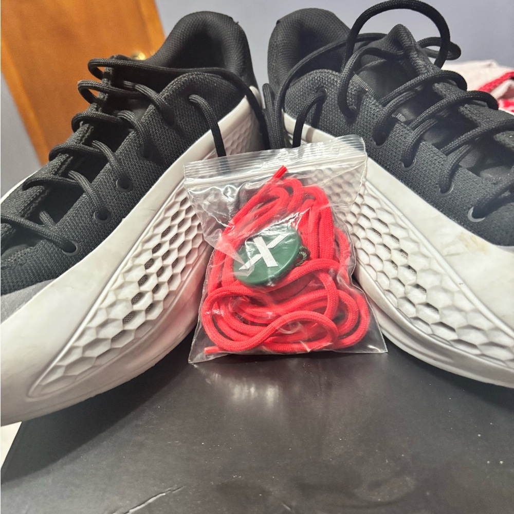 Black and White Athletic Sneakers with Red Laces